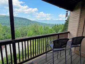 Small walkout deck on the main level with beautiful views. Accessible from both the living room and King Bedroom.
