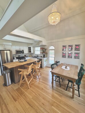 Spacious open kitchen and dining room for cozy meals and morning coffee