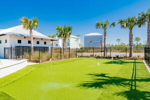 Step outside and breathe in the freshness of lush green grass.