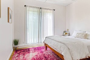 First floor bedroom with slider access to deck.