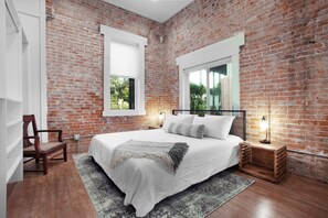 Bedroom #2 with kind-sized bed and extra large open closet space.