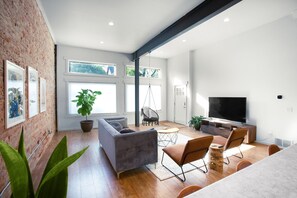 65" Roku TV and Ecobee smart thermostat (set your own comfort settings).