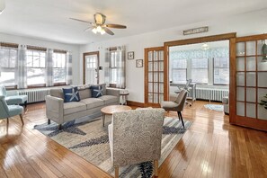 Cozy up in the heart of the bungalow—perfect for family movie nights and relaxing after a day by the water.
