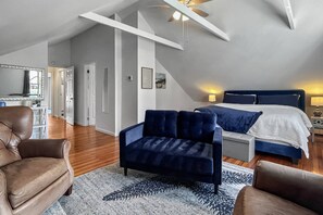Private comfort in the master suite—an inviting corner to unwind and recharge with a peaceful atmosphere.