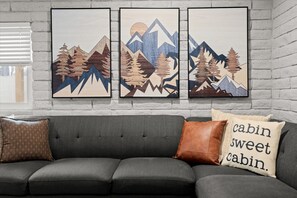 Sink into comfort and enjoy the spacious vibes. Our modern living room is designed for relaxation, conversation, and cozy moments.