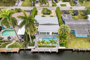 Stunning bird’s-eye view! Take in the full charm of this beautiful home, perfectly nestled in its scenic surroundings.