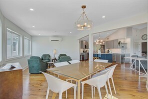 The open-concept dining and kitchen area is ideal for socializing and meal preparation.
