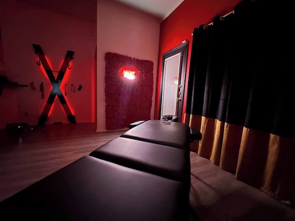🔥 Indulge in Luxury & Sensual Exploration 🔥
Step into an intimate escape designed for both pleasure and relaxation. Enjoy a sensual massage experience on the premium massage table, capture stunning moments against the vibrant flower selfie wall, and explore new fantasies with the St. Andrew’s Cross. This space is the perfect blend of luxury, adventure, and comfort.
✨ Dare t...