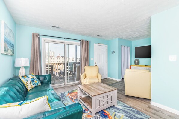 Large living room and dining table of the balcony !