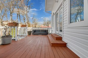 Welcome to Capital Getaway! Relax on the deck, unwind in the fresh air, and enjoy a peaceful retreat after a day of exploring.