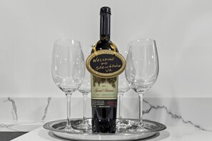 Enjoy a thoughtfully selected bottle of wine as our warm welcome to enhance your stay. 🍷✨
