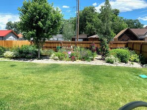 Fenced back yard and gardens