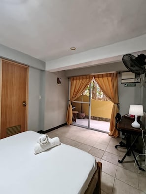 bedroom leads onto patio