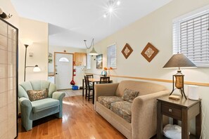 Relax and recharge in this inviting living space, featuring a comfy pull-out sofa.