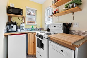 Cook like you’re at home with a fully equipped kitchenette, including a stove, oven, and dishwasher.