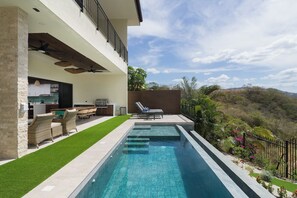 beautiful infinity pool and outdoor living space