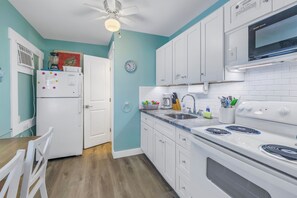 Fuel your island adventures with easy meal prep in this bright kitchen.