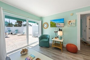 Enjoy seamless indoor-outdoor living with easy access to the pool area.