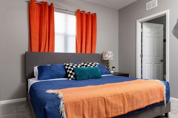 Step into a sanctuary of comfort and style! This beautifully designed bedroom features a luxurious king-size bed.