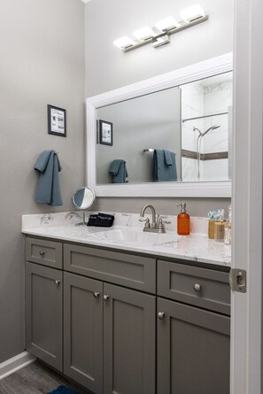 This bathroom setup is all about simplicity and style with all the essentials to start and end your day.