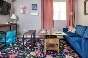 Our living room is all about relaxation and entertainment. Who's ready for a binge-watching session?