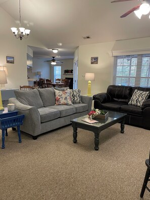 The main living area with a view into the dining area. 