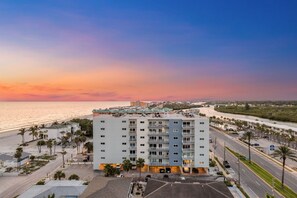 Welcome to San Remo! This building overlooks the beach and its beachfront pool!