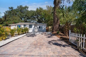 This is the free private driveway designated for Bayou Hammock Guests only. Please do not park in the driveway to the left of this that is black. You will see the address on the mailbox and lights if its dark. One car fits perfectly, 2 is tight.