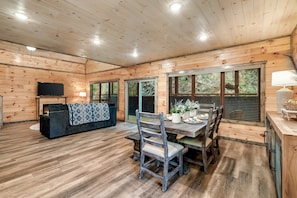 The cozy living room is perfect for relaxing with family. Equipped w/ smart TV.