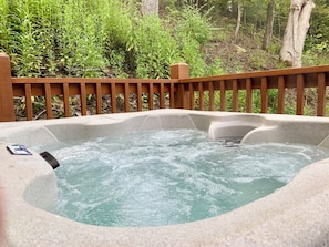Come unwind in the private 4 person hot tub located on the back of the deck.