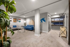 Relax in our 2nd living area located in the basement perfect for a movie night with popcorn