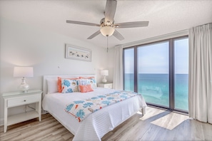 Gulf front master bedroom with a king size bed