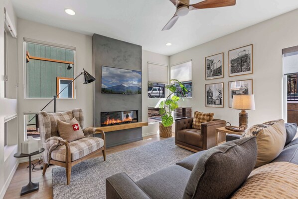 Spacious living room with Smart TV and fireplace
