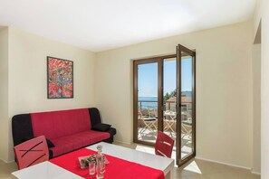Living room (dining table, sofa)