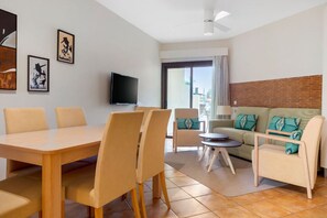 Dining area connected to the living space, ideal for family meals and gatherings.