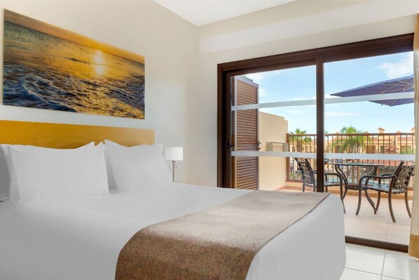 Plush bed and classic furnishings for a touch of elegance.