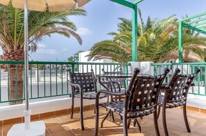 Savor your morning coffee on a balcony with breathtaking views and a gentle breeze.