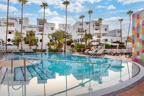 A refreshing and stylish pool area that invites relaxation and social moments.