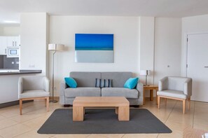 Contemporary living space with a pop of color, ideal for relaxation.