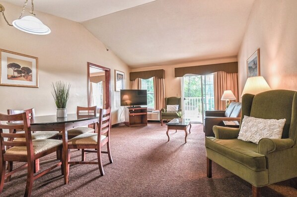 Living area. Exact unit will be assigned upon arrival. Views, colors, and decor may vary.