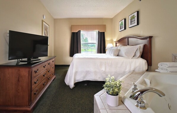Unit with King bed. Exact unit will be assigned upon arrival. Views, colors, and decor may vary.