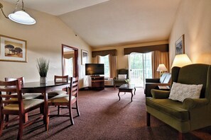 Living area. Exact unit will be assigned upon arrival. Views, colors, and decor may vary.