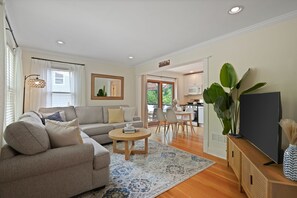 Enjoy the beautiful living room with large pit sofa and smart TV.