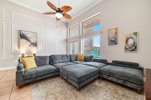 Large living area with tall ceilings