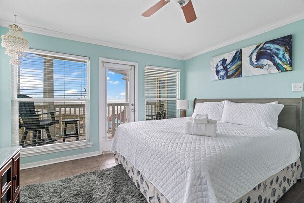 This master bedroom has a patio access with ocean views.