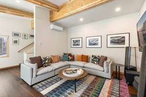 The Media/Game level of the home, features state of the art sound system and entertainment area as well as a 3rd Guest room with ensuite bathroom and accesses to The Upper deck space.