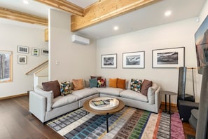 The Media/Game level of the home, features state of the art sound system and entertainment area as well as a 3rd Guest room with ensuite bathroom and accesses to The Upper deck space.