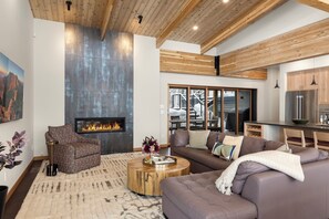 Dining/living level allows easy access to the outdoor decking/dining area with Gas fireplace and Gas Grill.