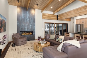 Dining/living level allows easy access to the outdoor decking/dining area with Gas fireplace and Gas Grill.