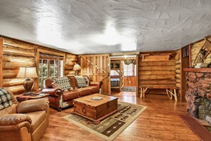 Inside, you'll find a large dreamy kitchen perfect, a cozy stone fireplace to unwind by, and vintage details that transport you back in time.